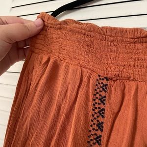 American Eagle Size Large Rust Orange and Navy Embroidered Flowy Pants